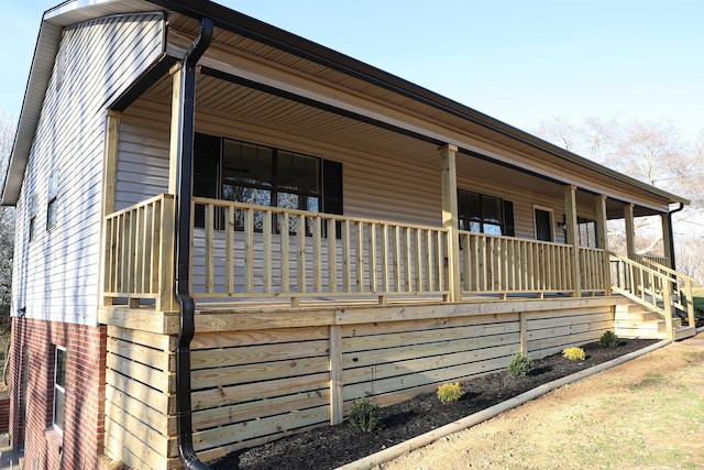 view of home's exterior featuring a porch