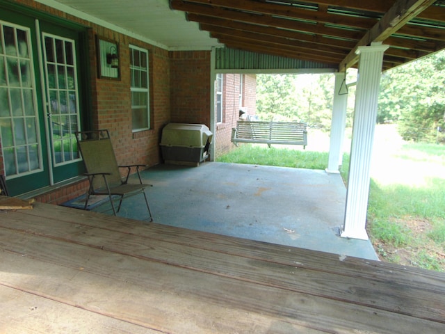 view of patio with a wooden deck