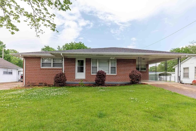 ranch-style home featuring a front yard, driveway, an attached carport, and brick siding