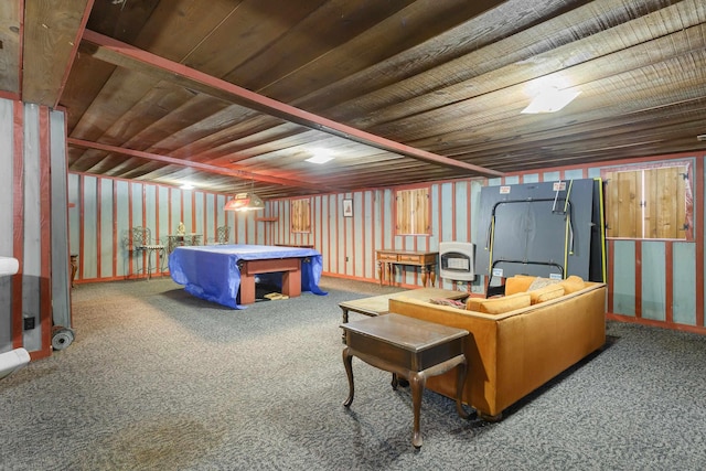 interior space featuring carpet, wood ceiling, and heating unit