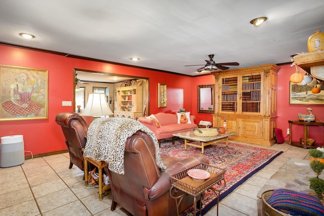 living room with light tile patterned floors, ceiling fan, and ornamental molding