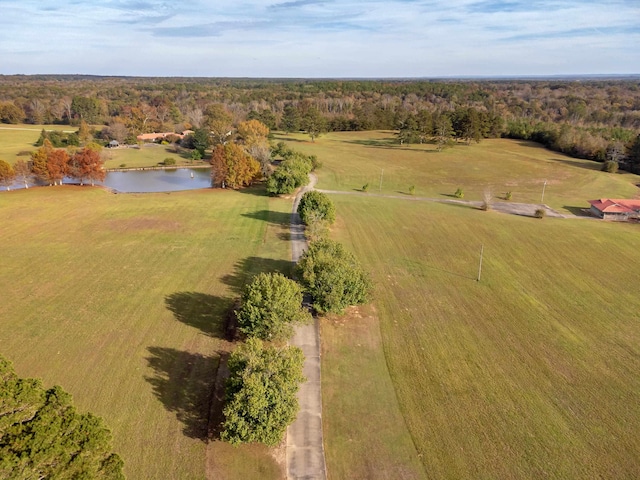 birds eye view of property featuring a water view and a rural view