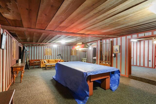 recreation room with carpet flooring and wooden ceiling