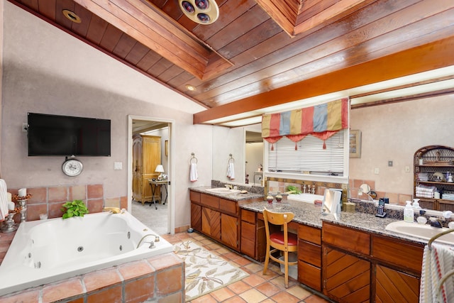 bathroom featuring tile patterned floors, vanity, a relaxing tiled tub, wooden ceiling, and lofted ceiling