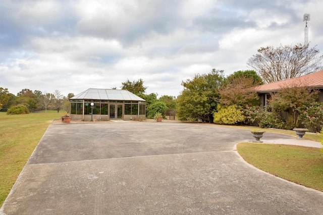 surrounding community featuring a gazebo and a yard