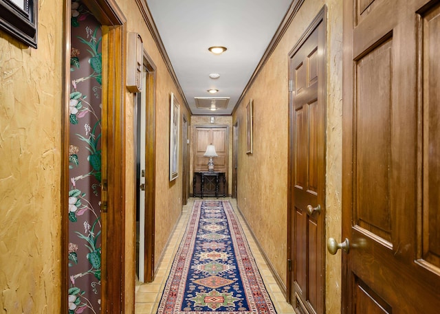 hall featuring ornamental molding