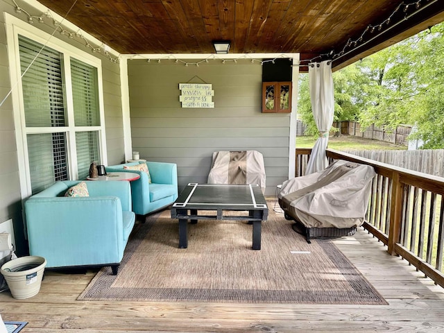  - wooden deck with fence and outdoor lounge area