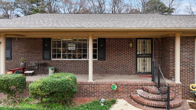 doorway to property featuring a porch