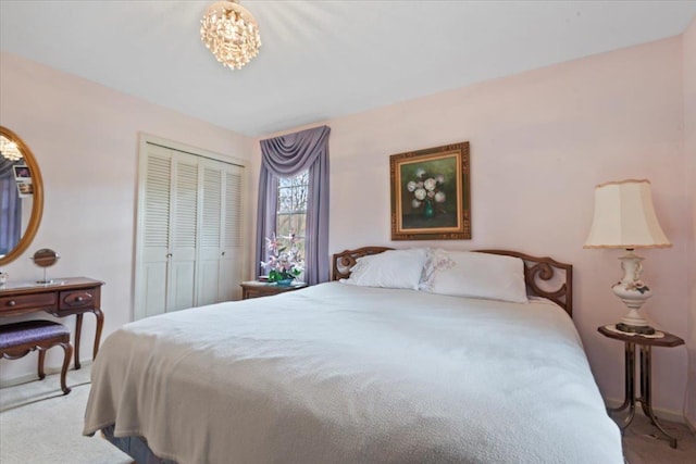 carpeted bedroom featuring a closet