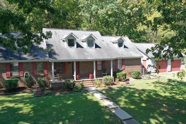 cape cod-style house with a porch and a front yard