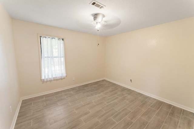 empty room featuring ceiling fan