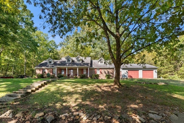 ranch-style home with a front lawn and a garage