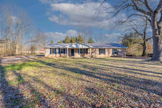 ranch-style home with a porch and a front lawn