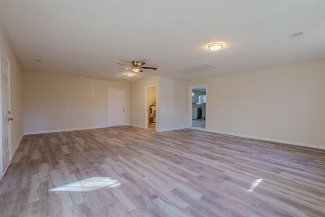 spare room with ceiling fan and light hardwood / wood-style flooring