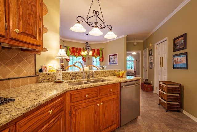 kitchen featuring pendant lighting, dishwasher, backsplash, sink, and a healthy amount of sunlight