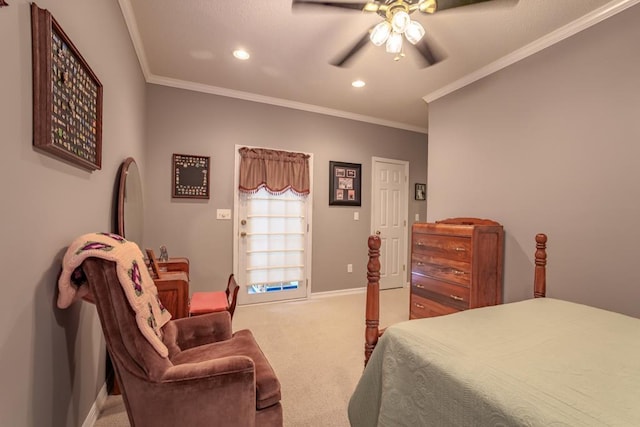 bedroom featuring carpet floors, ceiling fan, and crown molding