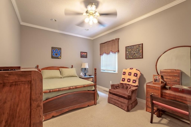 carpeted bedroom featuring ceiling fan and crown molding