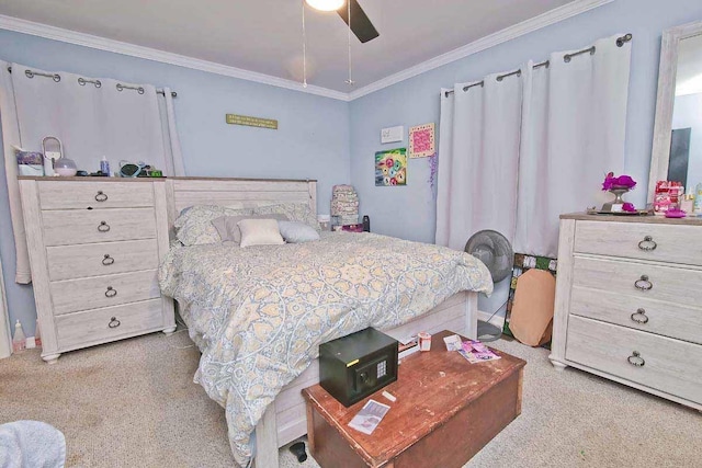 carpeted bedroom with ceiling fan and crown molding