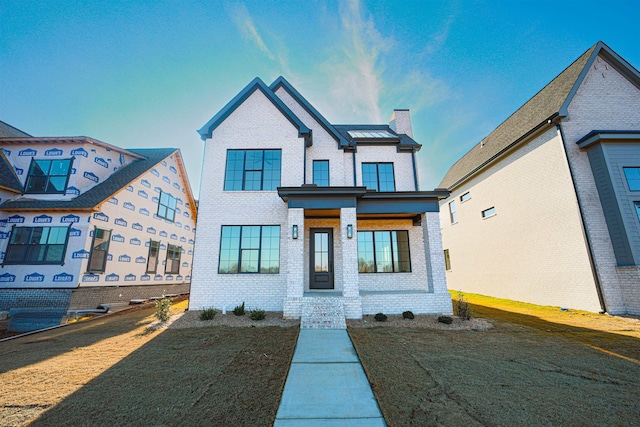 view of front of home with a front yard