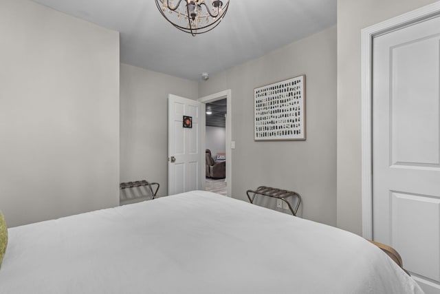bedroom featuring a chandelier