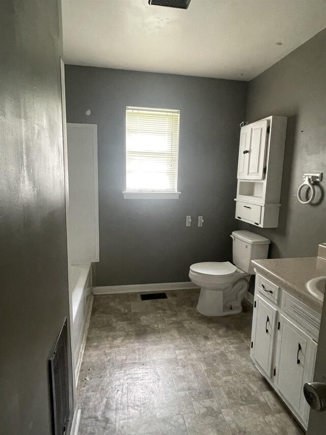  - full bathroom featuring toilet and vanity
