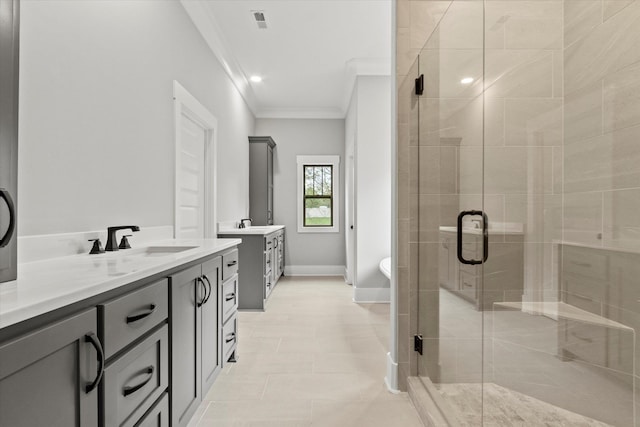 bathroom featuring tile patterned floors, vanity, crown molding, and independent shower and bath