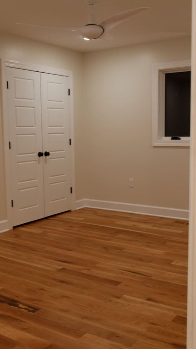 empty room featuring hardwood / wood-style flooring