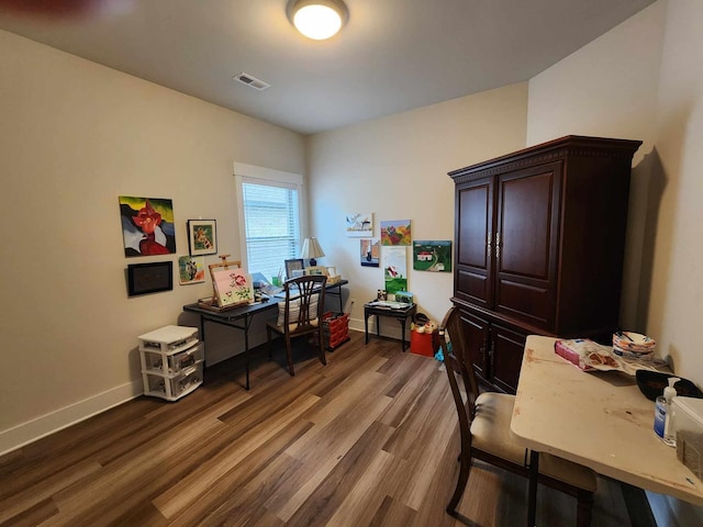 home office featuring hardwood / wood-style flooring