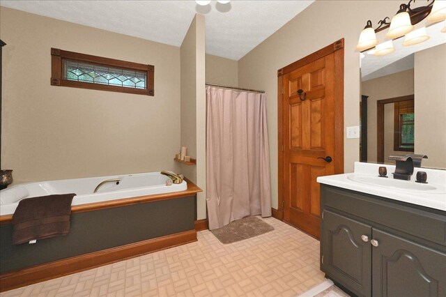  - full bathroom featuring a garden tub, vanity, a shower with shower curtain, and baseboards