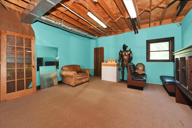 - sitting room featuring carpet