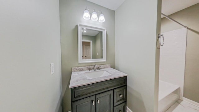 bathroom with vanity and washtub / shower combination