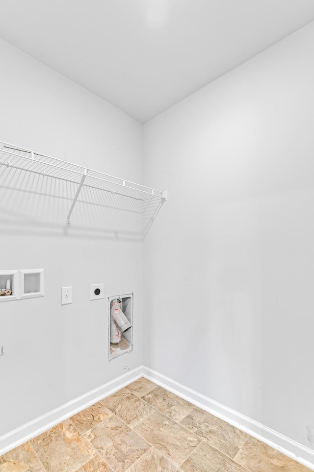  - laundry room featuring hookup for an electric dryer, washer hookup, baseboards, and light stone finish floors