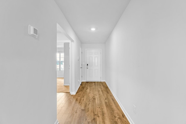  - hallway with light wood-style flooring, baseboards, and recessed lighting