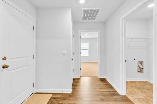  - foyer entrance with recessed lighting, baseboards, and wood finished floors