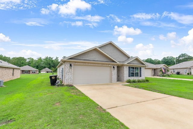  - view of front of house featuring an attached garage, a front yard, concrete driveway, and brick siding