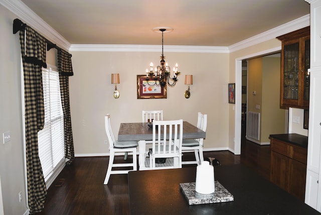  - dining room with a chandelier, dark wood-style flooring, crown molding, and baseboards