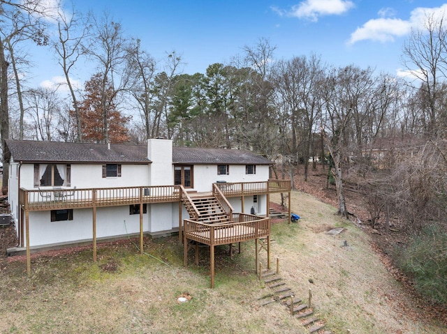 rear view of property with a deck