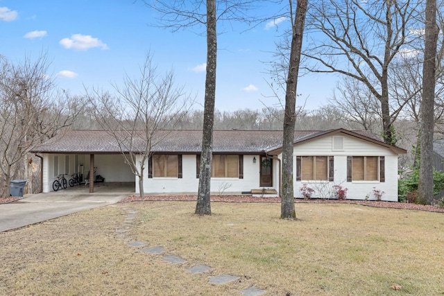 single story home with a carport and a front lawn