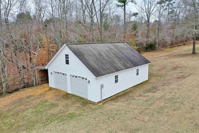 garage with a yard