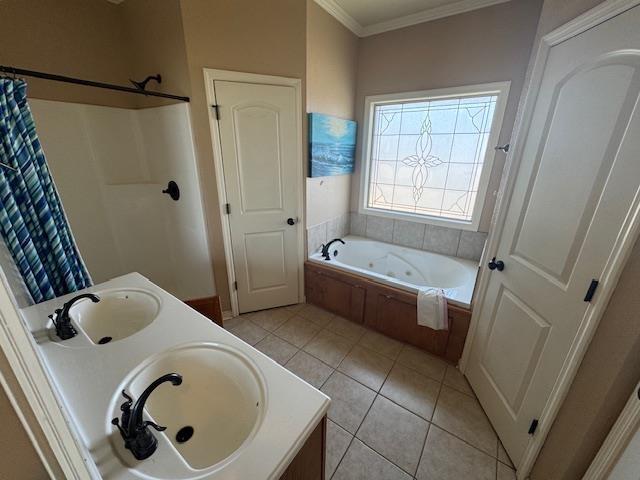 bathroom featuring curtained shower, a sink, a tub with jets, and tile patterned floors