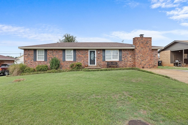 single story home featuring a front yard