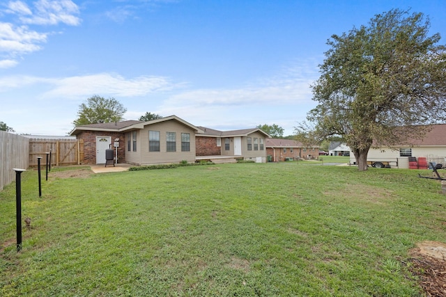 exterior space featuring a front lawn