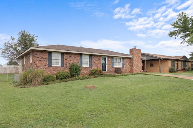 single story home with a front lawn