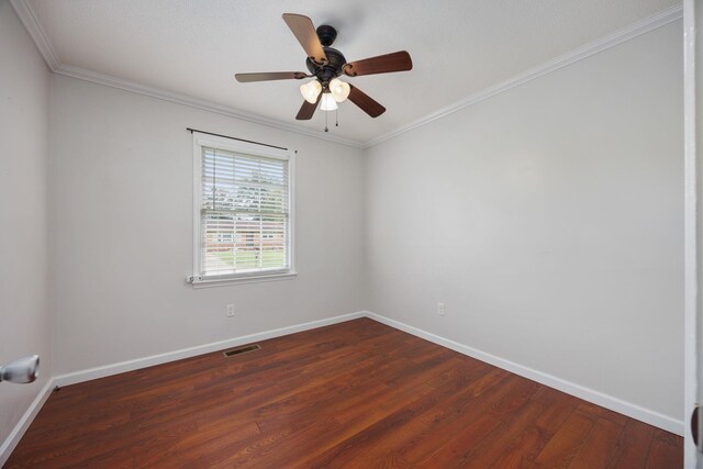 unfurnished room featuring crown molding, dark hardwood / wood-style flooring, and ceiling fan