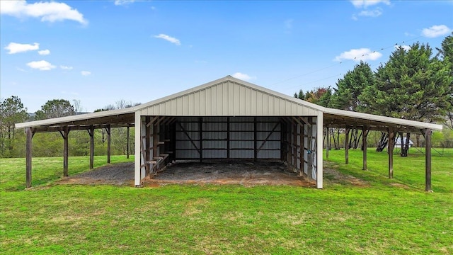 exterior space with an outbuilding and a lawn