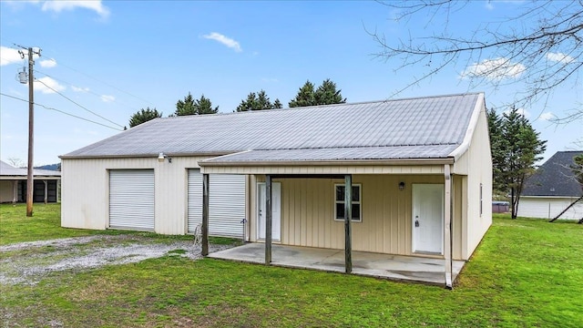 detached garage featuring driveway