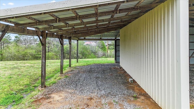 view of parking with an attached carport