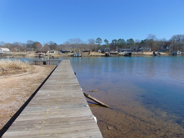 view of dock with a water view