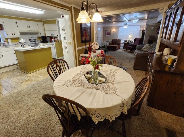  - dining space with ornamental molding