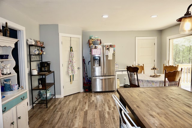 dining space featuring hardwood / wood-style floors